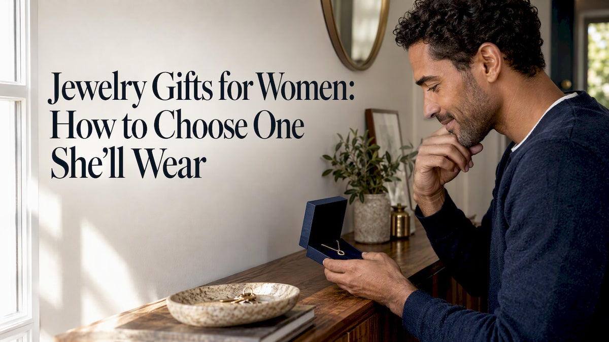 Gift buyer considering jewelry in a navy box