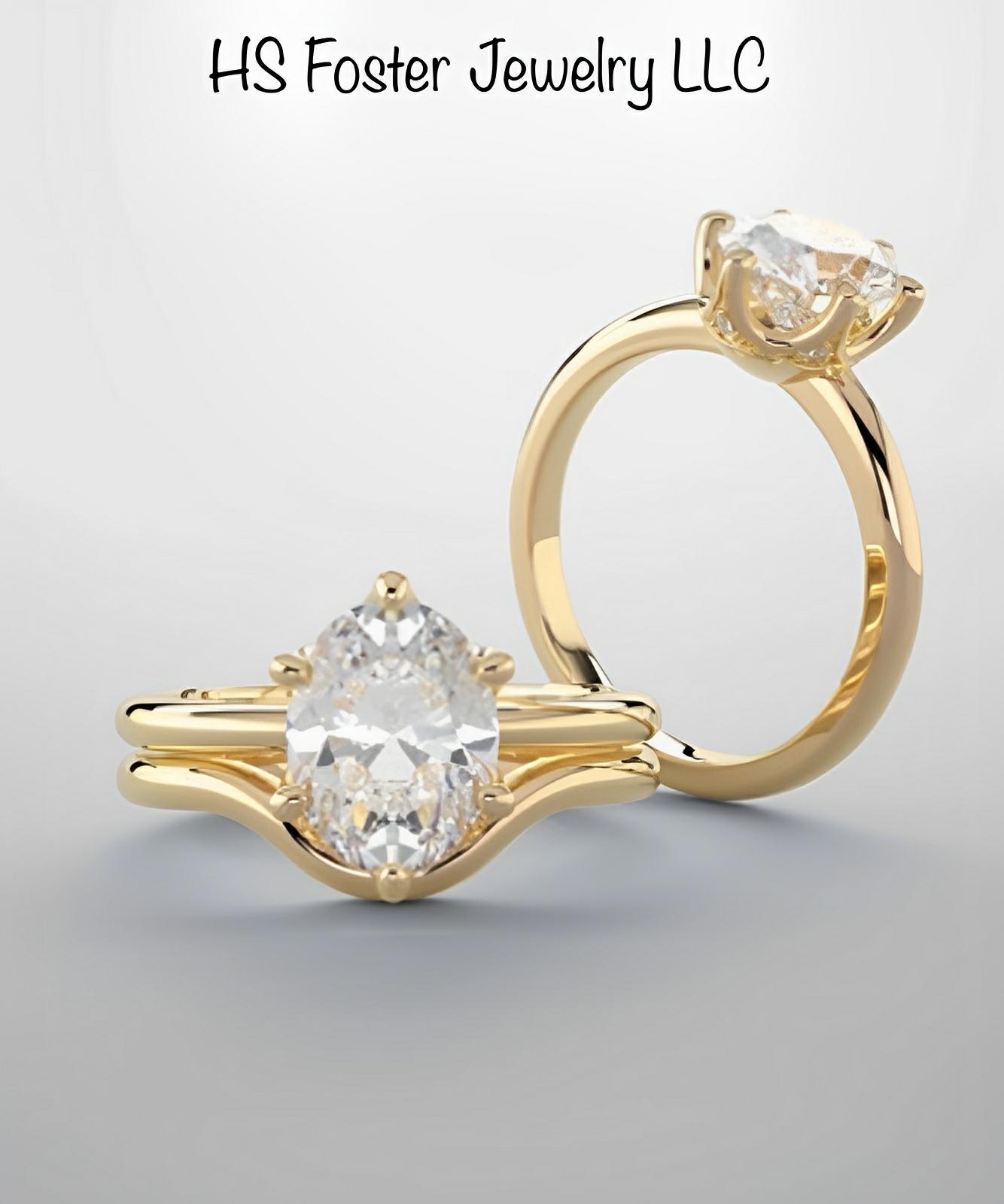 Yellow gold natural oval diamond ring.