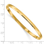 14k Yellow Gold 4mm Solid Polished Half-Round Slip-On Round Bangle Bracelet, shown with a ruler for scale