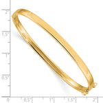 14k Yellow Gold Polished 4.00mm Hinged Oval Bangle Bracelet, shown with a ruler for scale