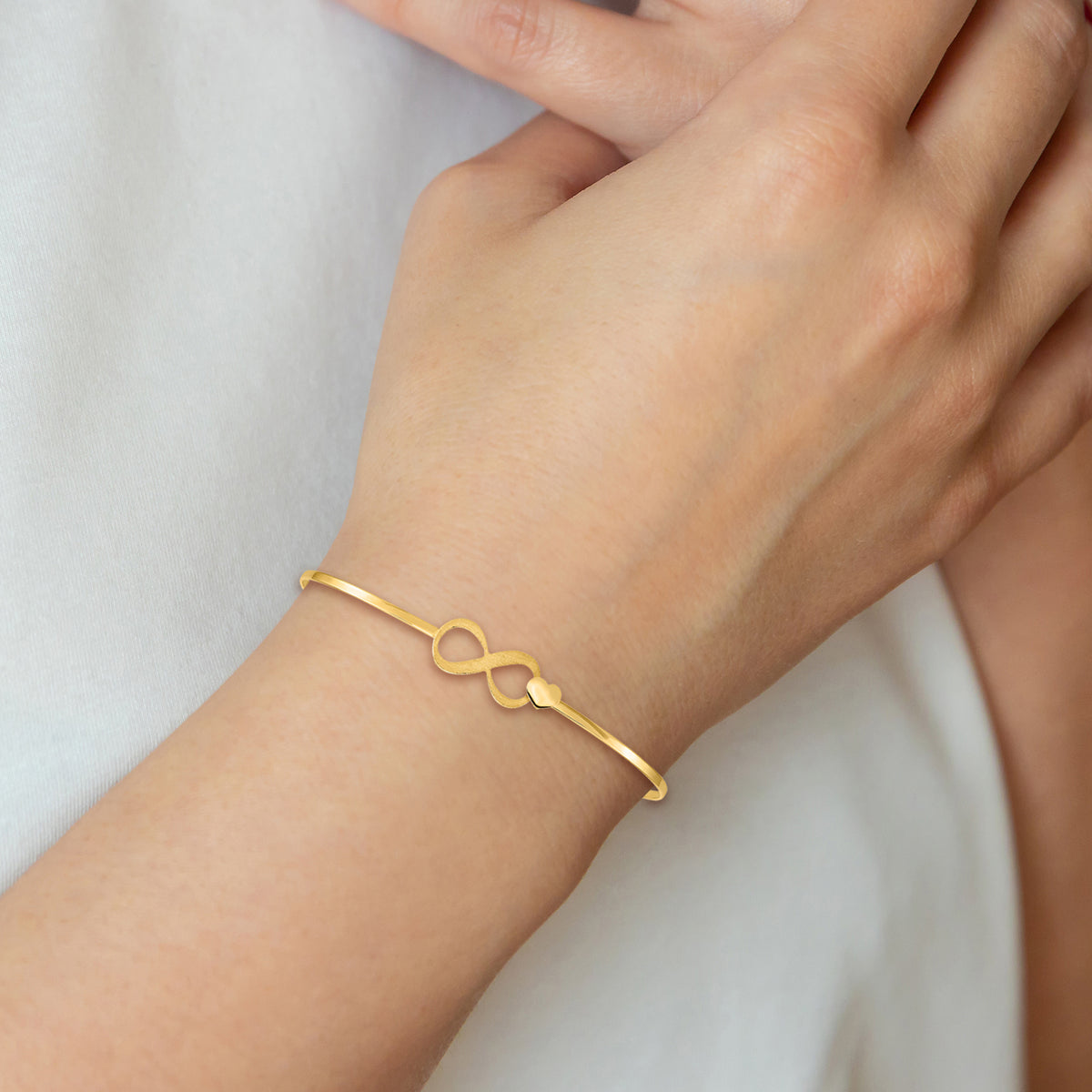 14k Yellow Gold Brushed & Polished Infinity & Heart 1.65mm Flexible Oval Bangle Bracelet, view 6