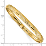 14k Yellow Gold Textured & Diamond-cut Twist Pattern 6.20mm Flexible Oval Bangle Bracelet, shown with a ruler for scale