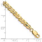 14k Yellow Gold Polished 5mm Diamond-cut 7 inch Bracelet, shown with a ruler for scale