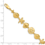 14k Yellow Gold Polished Sea Life 7.25 inch Bracelet, shown with a ruler for scale