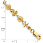 14k Yellow Gold Polished and Textured Sea Life 7 inch Bracelet, shown with a ruler for scale