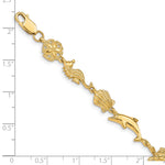 14k Yellow Gold Polished Sea Life 7 inch Bracelet, shown with a ruler for scale