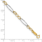 14k Two-Tone Gold Polished Oval Design 7.25 inch Bracelet, shown with a ruler for scale