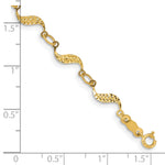 14k Yellow Gold Diamond-cut Wavy Link 7.5 inch Bracelet, shown with a ruler for scale