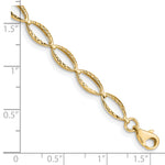 14k Yellow Gold Polished Textured Oval Link 7.25 inch Bracelet, shown with a ruler for scale