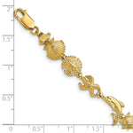 14k Yellow Gold Polished Dolphin and Sea Shells 7 inch Bracelet, shown with a ruler for scale