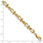 14k Yellow Gold Polished Anchor Shackle Bracelet, shown with a ruler for scale - 7.5 in