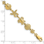 14k Yellow Gold Polished Turtle/Sand Dollar/Shell/Starfish Link Bracelet, shown with a ruler for scale - 7 in