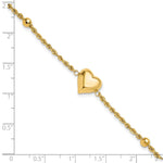 14k Yellow Gold Polished and Diamond-cut Beaded Puffed Heart 7.75 inch Bracelet, shown with a ruler for scale