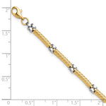 14k Two-Tone Gold Polished 3.5mm Fancy Twisted Bar Link 7.75 inch Bracelet, shown with a ruler for scale