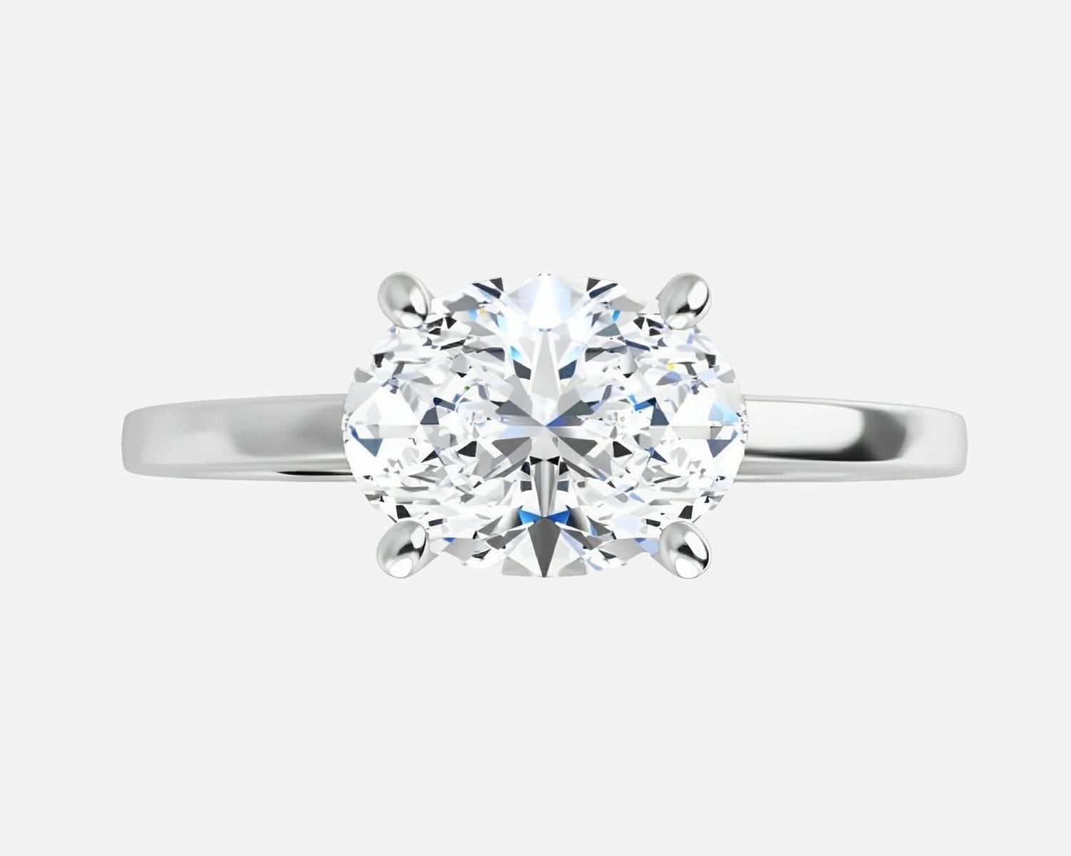 Moissanite oval 8x6mm in 10kt white gold.