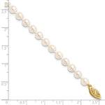14k Yellow Gold 5-6mm White Round Akoya Saltwater Cultured Pearl Bracelet, shown with a ruler for scale - 7 in