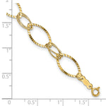 14k Yellow Gold Polished and Textured Fancy Oval Link 7.25 inch Bracelet, shown with a ruler for scale