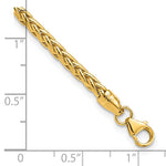 14k Yellow Gold Polished 3mm Fancy Braided Link 7.5 inch Bracelet, shown with a ruler for scale