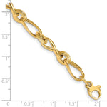 14k Yellow Gold Polished and Grooved Fancy Twisted Link 8-8.5 inch Bracelet, shown with a ruler for scale