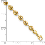 14k Yellow Gold Polished 4mm Fancy Link 7.5 inch Bracelet, shown with a ruler for scale