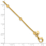 14k Yellow Gold Polished Diamond-cut Beads and Mesh Chain 7.5 inch Bracelet, shown with a ruler for scale
