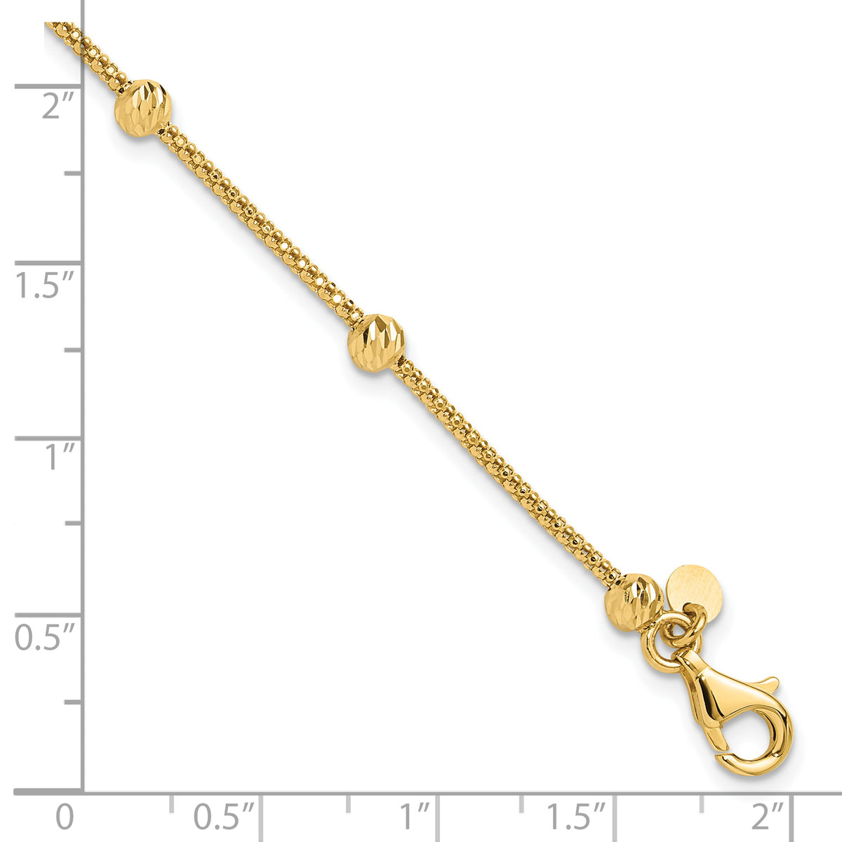 14k Yellow Gold Polished Diamond-cut Beads and Mesh Chain 7.5 inch Bracelet, shown with a ruler for scale