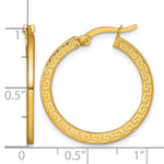 14k Yellow Gold Polished 1.5 x 24mm Textured Greek Key Hoop Earrings, shown with a ruler for scale